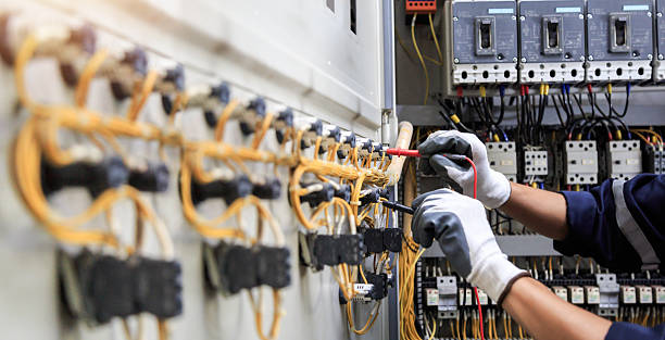 Professional Electrician technician working in Red Bud, IL
